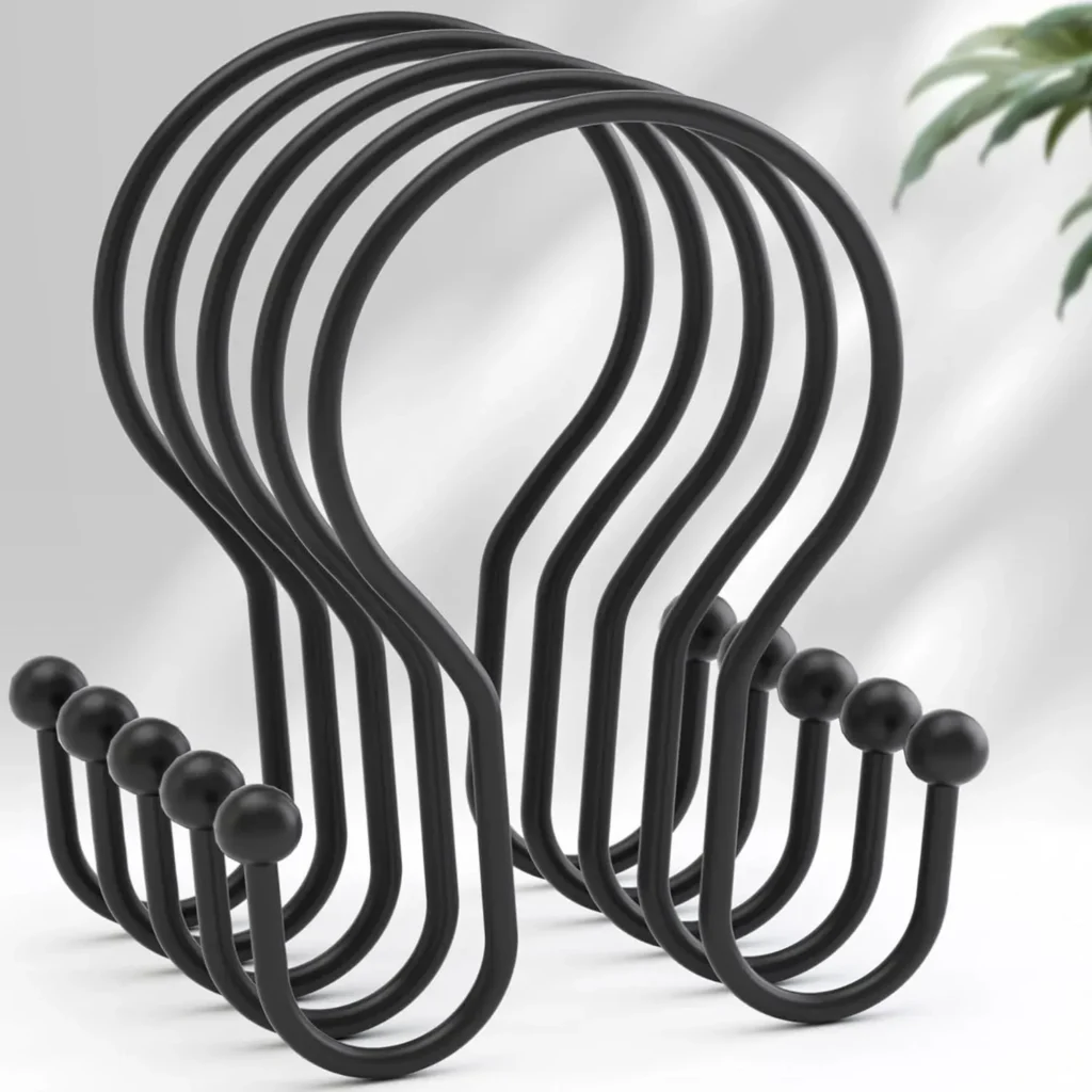 Matte black shower curtain hooks hanging on rod