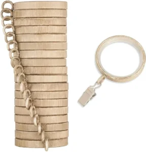 Golden metal curtain rings with eyelet hooks