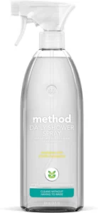 Clear bottle of Method Daily Shower Spray with eucalyptus mint scent and plant-based cleaning power.